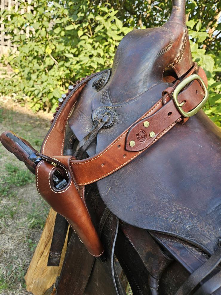 Holster for saddle